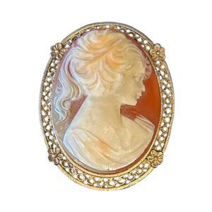 Vintage Oval Cameo Woman with Ponytail and Gold Metal Trim Brooch or Pendant